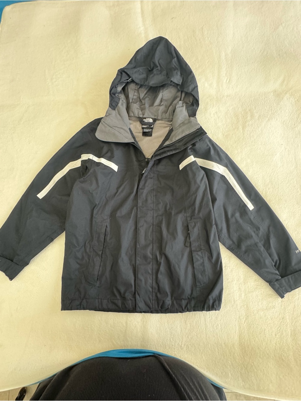 The North Face Men’s Black Hooded Rain Jacket with Reflective Stripes
